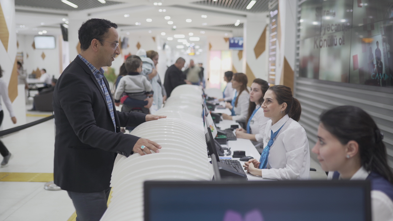 Filming at the airport check-in counter