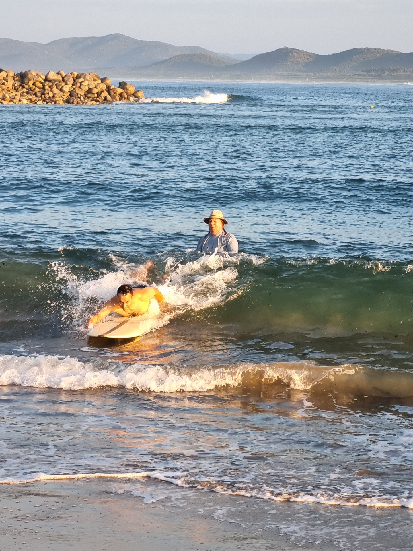 Off-camera moment by the surf